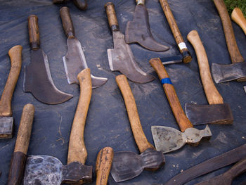High angle view of rusty metal on wood