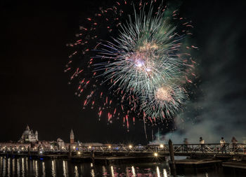 Firework display at night