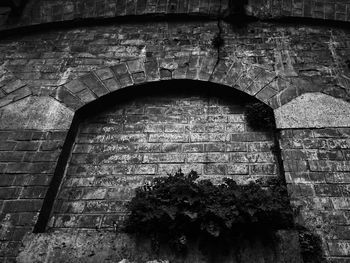 Low angle view of brick wall