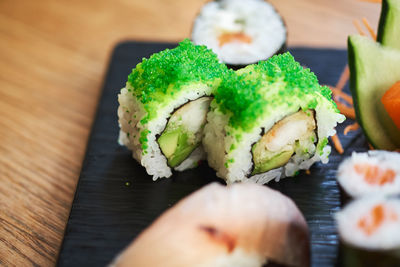 Close-up of sushi in plate on table