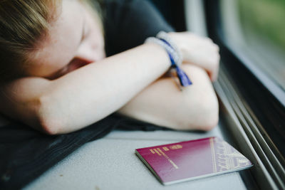 Woman sleeping in train