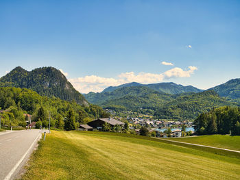 Scenic view of landscape and mountains against sky