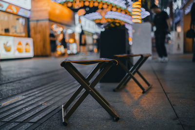 Close-up of empty chairs and table in restaurant