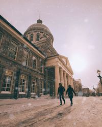 Tourists in front of historical building