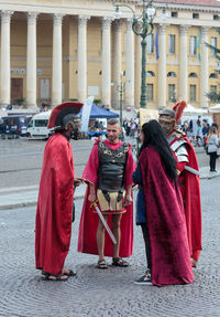 Rear view of traditional clothing in city