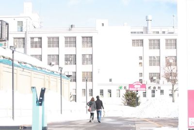 Woman standing in city
