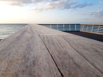 Pier over sea against sky