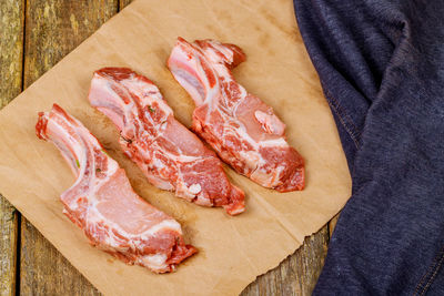 High angle view of meat on wooden table