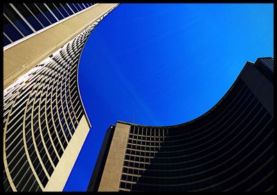 Low angle view of modern building against clear sky