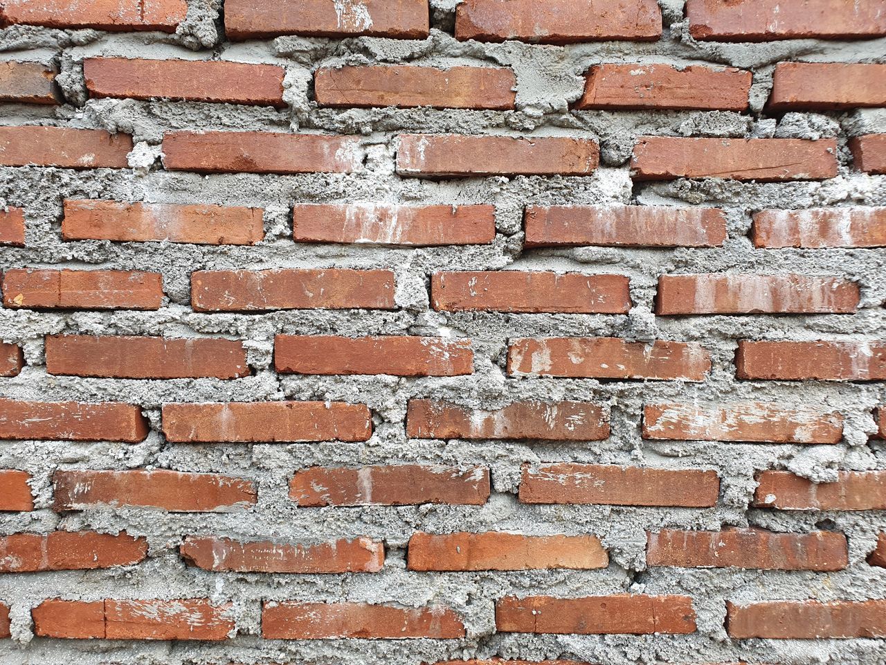 FULL FRAME SHOT OF STONE WALL