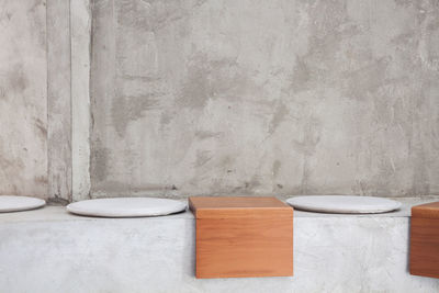 View of wooden table against wall at home