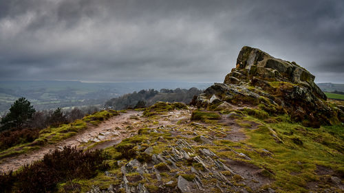 Rock formations on mountain against sky