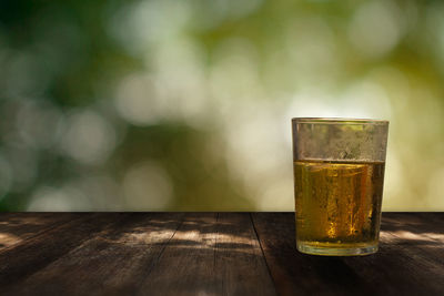 Close-up of beer glass on table