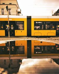 Train at railroad station in city