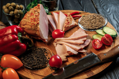 High angle view of fruits on cutting board