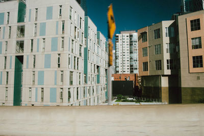 Buildings against clear sky in city