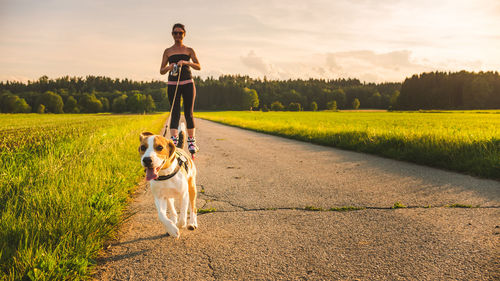 Man with dog on field