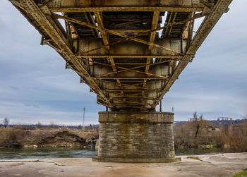 Bridge over river against sky