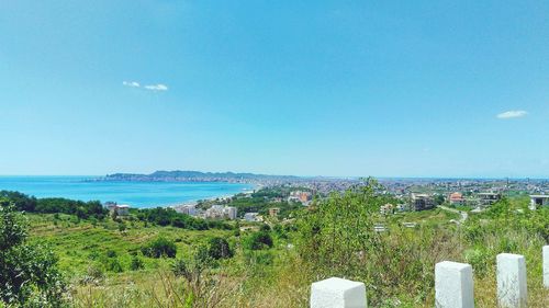 Scenic view of sea against clear blue sky