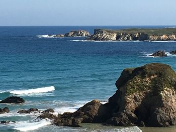 Scenic view of sea against clear sky