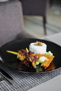 Close-up of food in plate on table