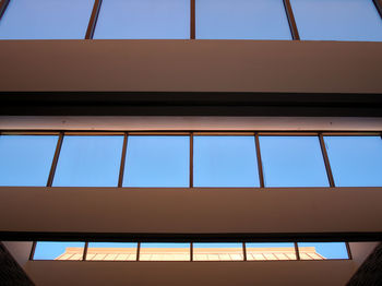 Low angle view of building against blue sky
