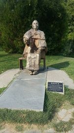 Statues on footpath