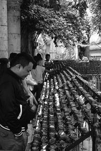 People at market stall