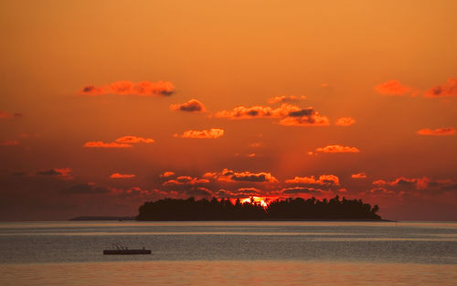 Scenic view of sunset over island in the maldives