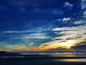 Scenic view of sea against sky at sunset