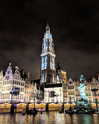 Illuminated buildings in city at night