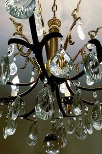 Low angle view of illuminated chandelier