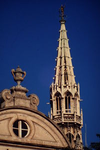 Clock tower against blue sky