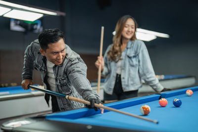 Man playing pool