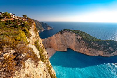 Scenic view of sea against clear blue sky