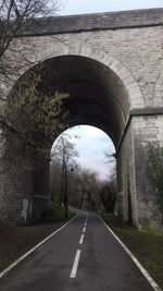 Road seen through bridge