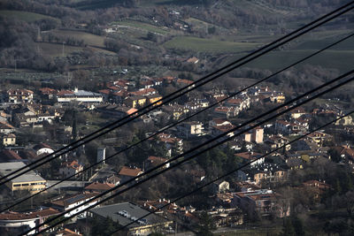 High angle view of illuminated buildings in city
