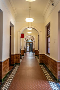 Illuminated corridor of building