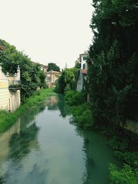View of canal in city