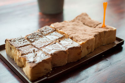 Close-up of chocolate cake in plate on table