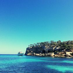 Scenic view of sea against clear sky