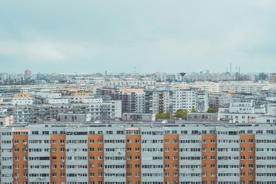 Close-up of cityscape against sky