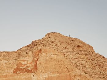 Low angle view of mountain against clear sky