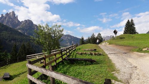 Scenic view of landscape and mountains against sky