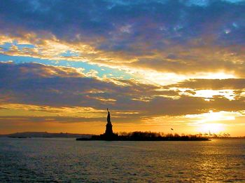 Scenic view of sea at sunset