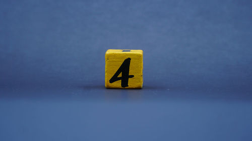 High angle view of dices on table