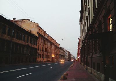 View of city street against clear sky