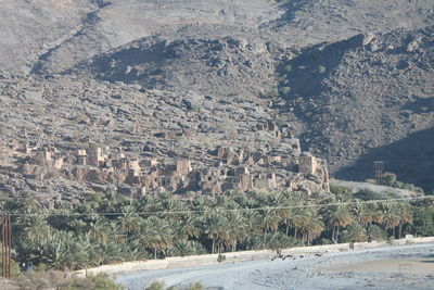 Aerial view of river with mountain in background