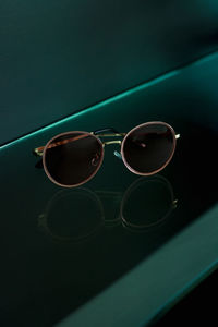 Close-up of sunglasses on table