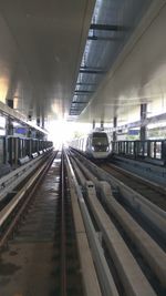 Railroad station platform against sky